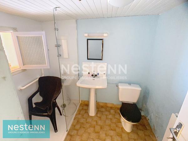 Ensemble immobilier de 2 maisons en pierres à SAINT CONNAN sur environ 1400 m² de jardin