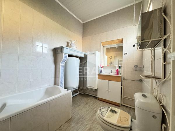 A VENDRE A PERIGUEUX MAISON DE VILLE AVEC JARDIN.