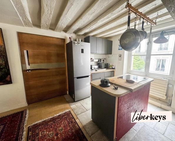 Appartement traversant avec vue sur cour classée - Paris 3e (75003)
