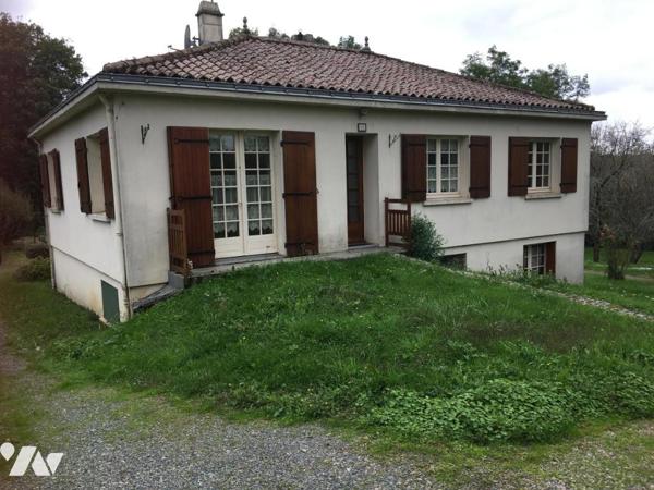 PAVLLON SUR SOUS-SOL AVEC BEAU TERRAIN