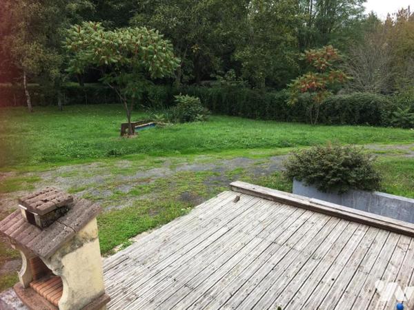 PAVLLON SUR SOUS-SOL AVEC BEAU TERRAIN