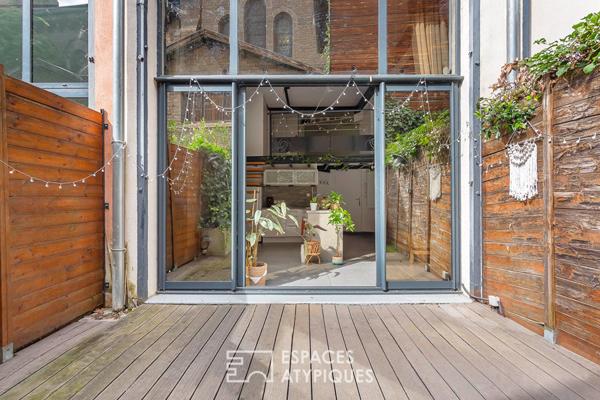 Loft avec terrasse dans un ancien atelier