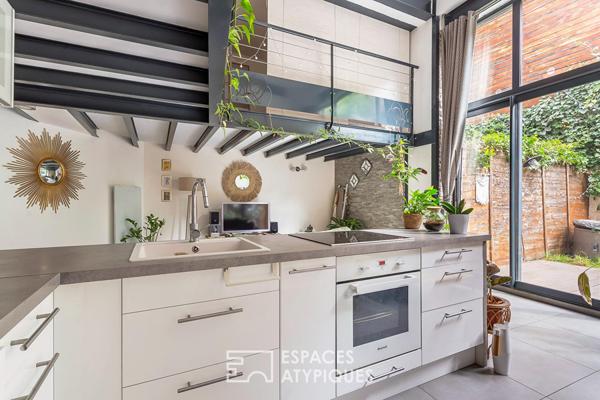 Loft avec terrasse dans un ancien atelier