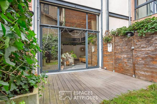 Loft avec terrasse dans un ancien atelier