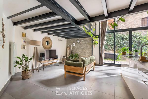 Loft avec terrasse dans un ancien atelier