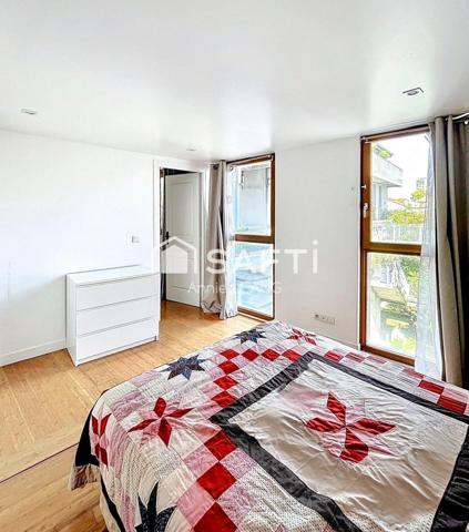 Loft lumineux avec terrasse, volumes exceptionnels et fort potentiel dans un quartier en pleine mutation.