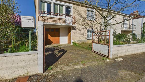 Maison à rafraîchir avec garage et jardin
