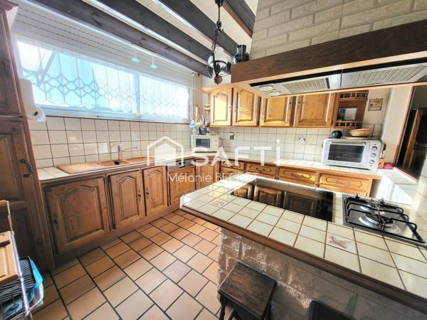 Maison familiale de 169 m² à fort potentiel  4 chambres à Marcheprime