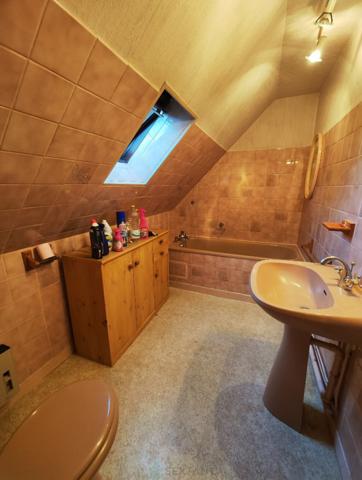 Agréable maison à rafrachir sur sous-sol complet