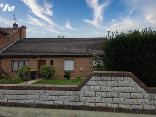 Plain pied une mitoyenneté avec sous sol complet