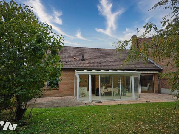 Plain pied une mitoyenneté avec sous sol complet