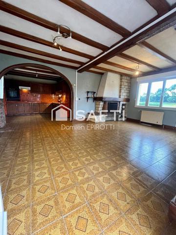 À vendre – Maison 115 m² avec jardin et grand garage loué.