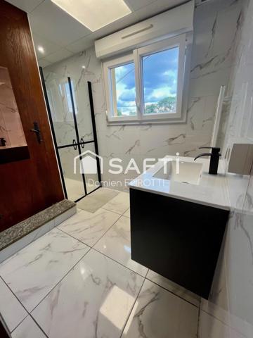 À vendre – Maison 115 m² avec jardin et grand garage loué.