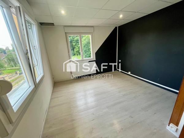 À vendre – Maison 115 m² avec jardin et grand garage loué.