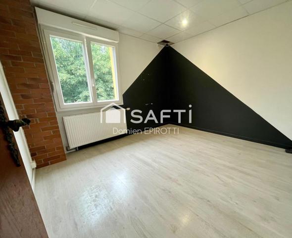 À vendre – Maison 115 m² avec jardin et grand garage loué.