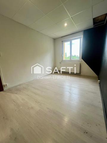 À vendre – Maison 115 m² avec jardin et grand garage loué.