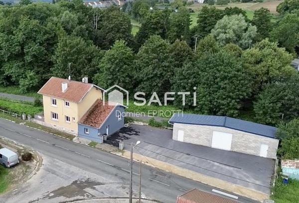 À vendre – Maison 115 m² avec jardin et grand garage loué.