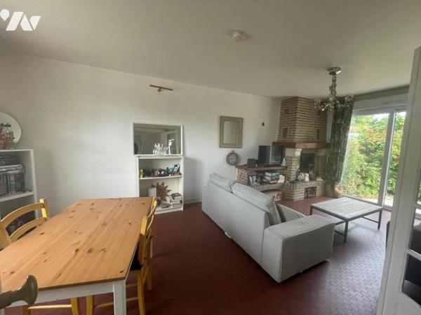Maison semi mitoyenne batir 4 chambres garage et jardin