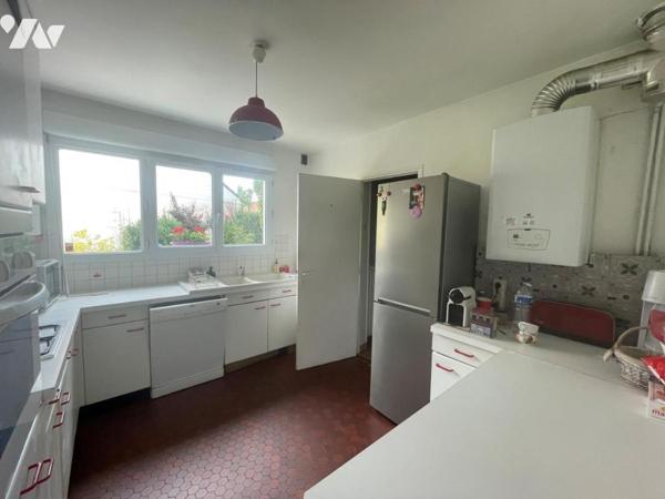 Maison semi mitoyenne batir 4 chambres garage et jardin