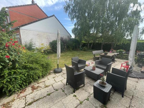 Maison semi mitoyenne batir 4 chambres garage et jardin