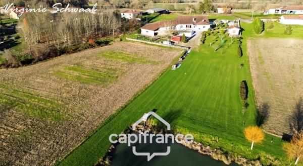 SAINT CRICQ CHALOSSE (40), Maison familiale de plain-pied avec étang sur 1 hectare de terrain en Chalosse