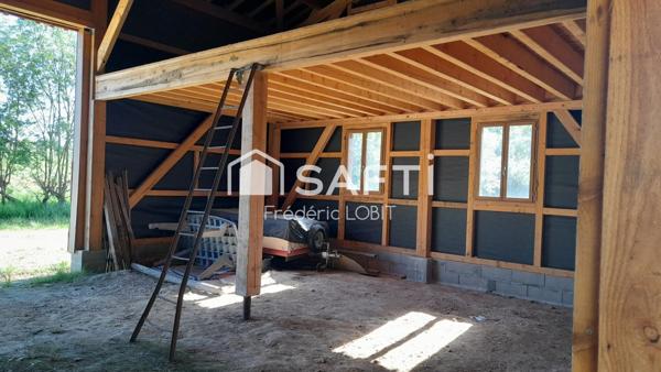 Bâtiment agricole de 192 m2 construit en 2021 par le compagnons du devoir sur son terrain certifier Bio de 84183 m2