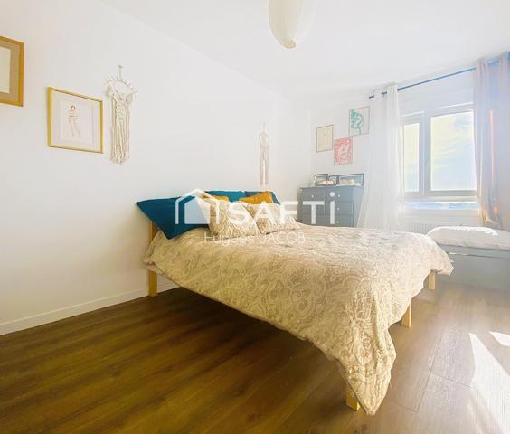 Appartement rénové avec balcon, garage et cave