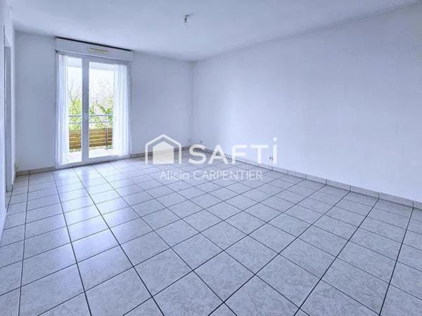 Appartement T2 avec un spacieux balcon et une place de parking privative