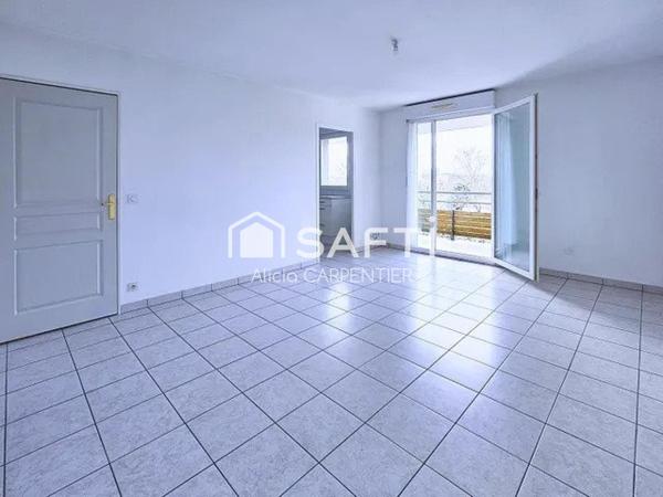 Appartement T2 avec un spacieux balcon et une place de parking privative