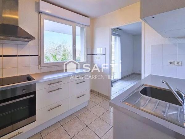 Appartement T2 avec un spacieux balcon et une place de parking privative