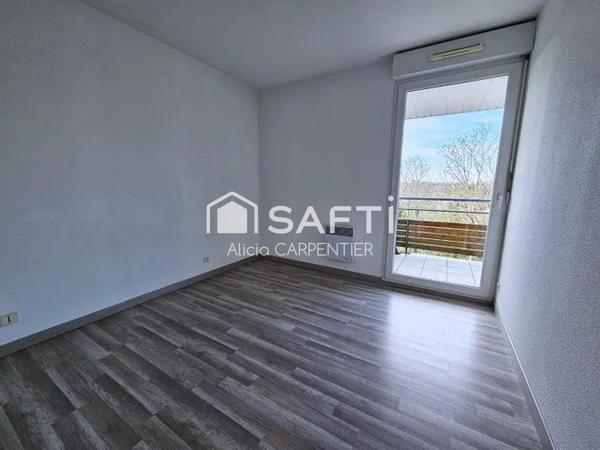 Appartement T2 avec un spacieux balcon et une place de parking privative