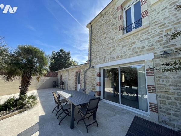 Maison d'habitation d'environ 170 m² habitables sur un terrain de 628 m².