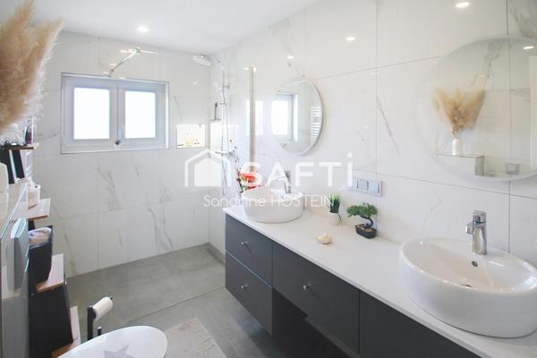 Maison rénovée 105m2 hab avec 3 chambres, garage, terrasse et jardin!