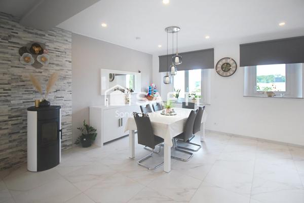 Maison rénovée 105m2 hab avec 3 chambres, garage, terrasse et jardin!