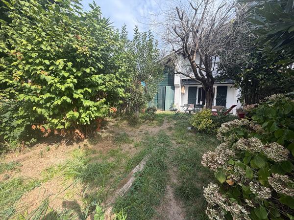 Maisonnette de type T2 avec jardin et parking