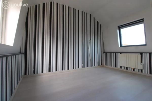 appartement F2 de 44m² habitable avec cave et place de parking privatif