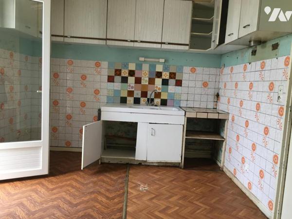 MAISON D'HABITATION A RESTAURER AVEC GARAGE ET JARDIN PROCHE ÉCOLES ET COLLEGE