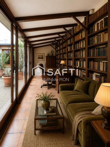 Maison de caractère organisée autour d'un patio central
