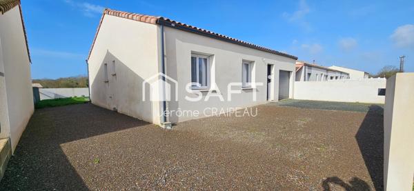 Maison récente non mitoyenne de plain pied aux Normes RT 2012 avec 3 chambres et garage.