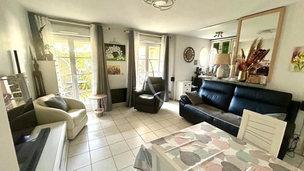 Appartement 3 pièces en rez-de-jardin avec loggia et jardin privatif