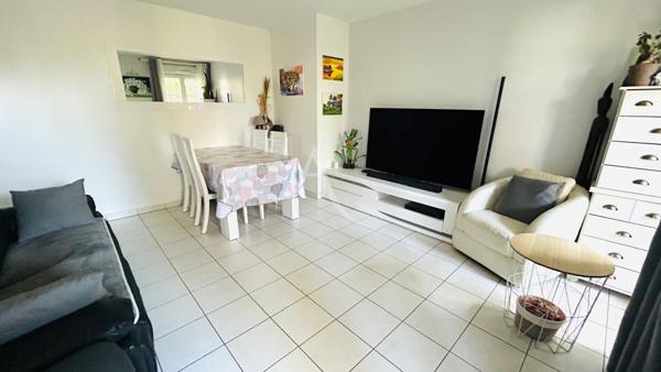 Appartement 3 pièces en rez-de-jardin avec loggia et jardin privatif