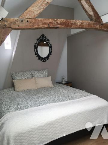 SPECIAL INVESTISSEUR au coeur du centre ville de BERGUES, immeuble de rapport mixte présente 
...