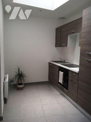 SPECIAL INVESTISSEUR au coeur du centre ville de BERGUES, immeuble de rapport mixte présente 
...