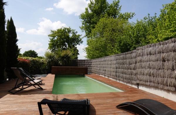 A vendre maison contemporaine à BETTON, piscine 10*3, 198m² habitable, 700m² de parcelle, 6 pièces, 4 chambres dont une suite parentale au rez-de-chaussée.