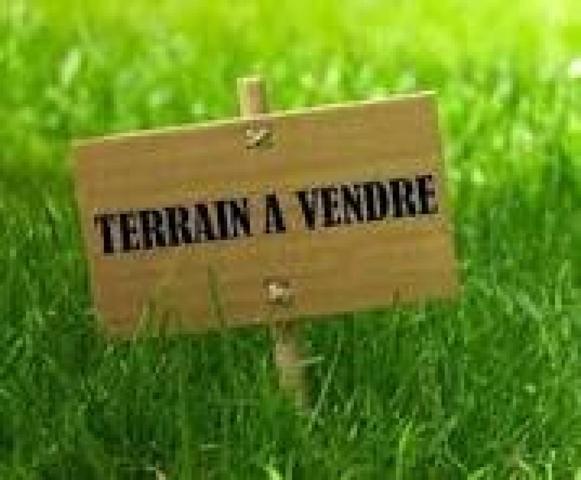 Terrain avec 16 m de façade et maison habitable