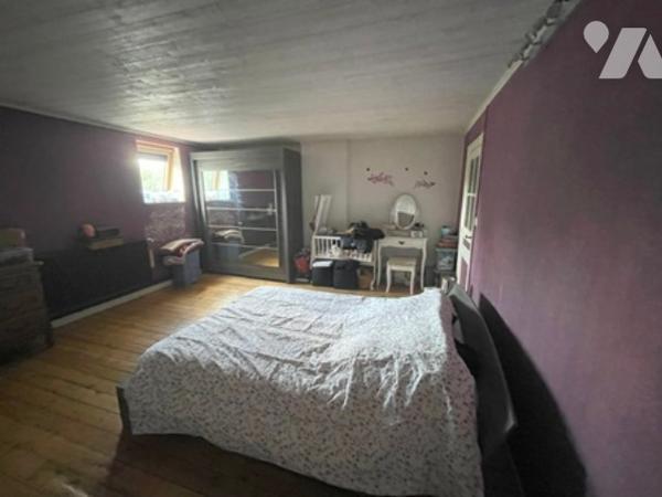 UNE MAISON A USAGE D'HABTIATION