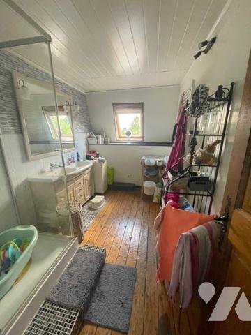 UNE MAISON A USAGE D'HABTIATION