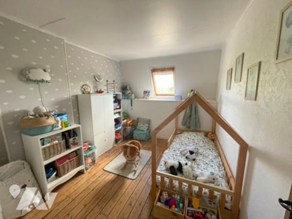 UNE MAISON A USAGE D'HABTIATION