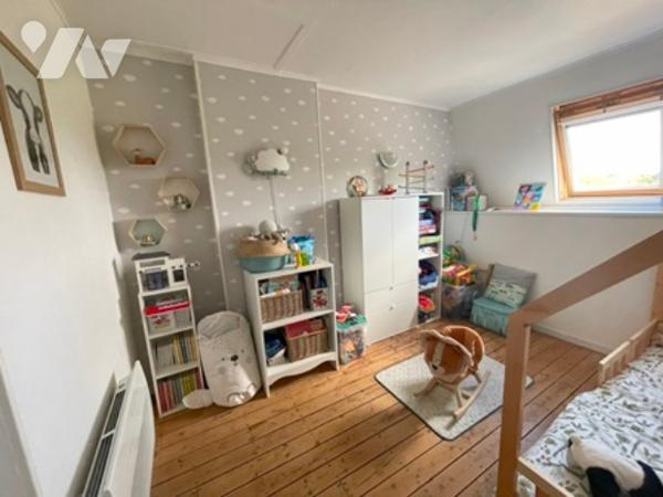 UNE MAISON A USAGE D'HABTIATION