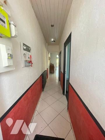 UNE MAISON A USAGE D'HABTIATION